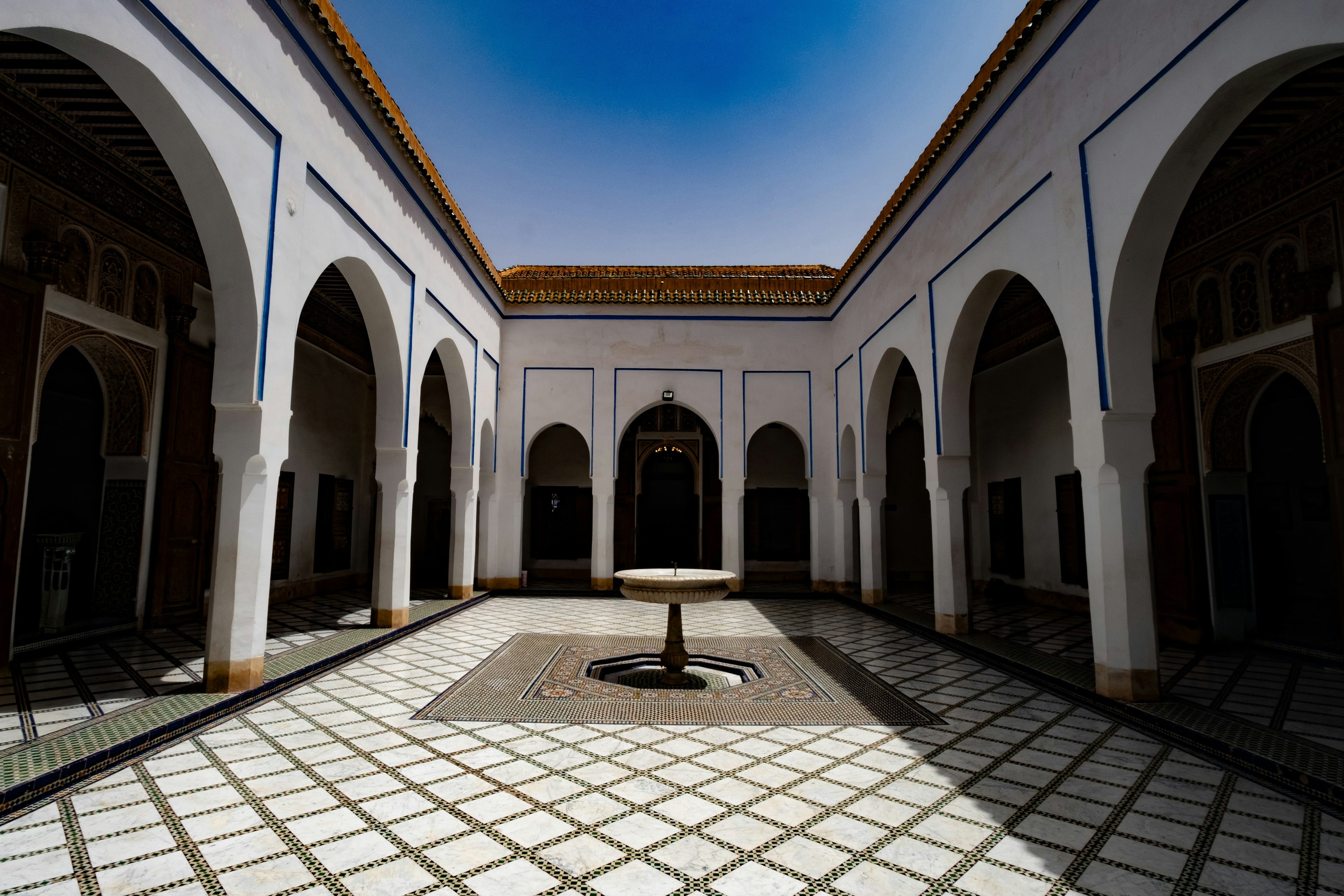 An arcaded palace courtyard with a fountain, Marrakech